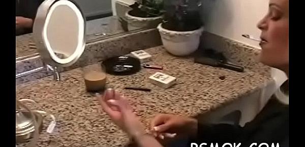  Ebon sucks a small cock while holding a lit cigarette
